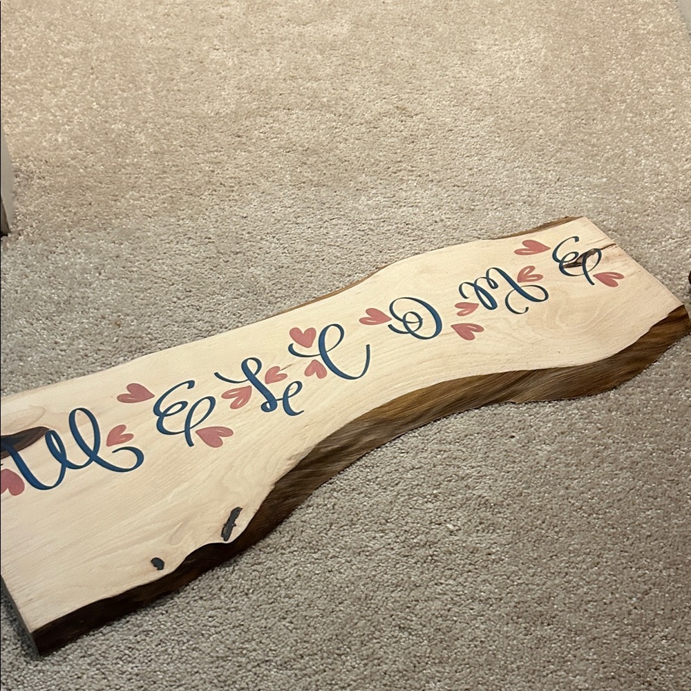 Rustic Welcome Sign with Pink and Blue Accents wall decor that was hand made .